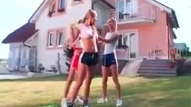 Girls in Adidas shine shorts and sports shoes