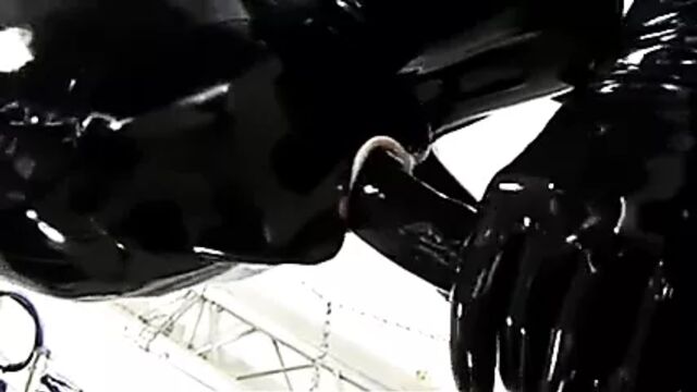 Dressing in a latex catsuit